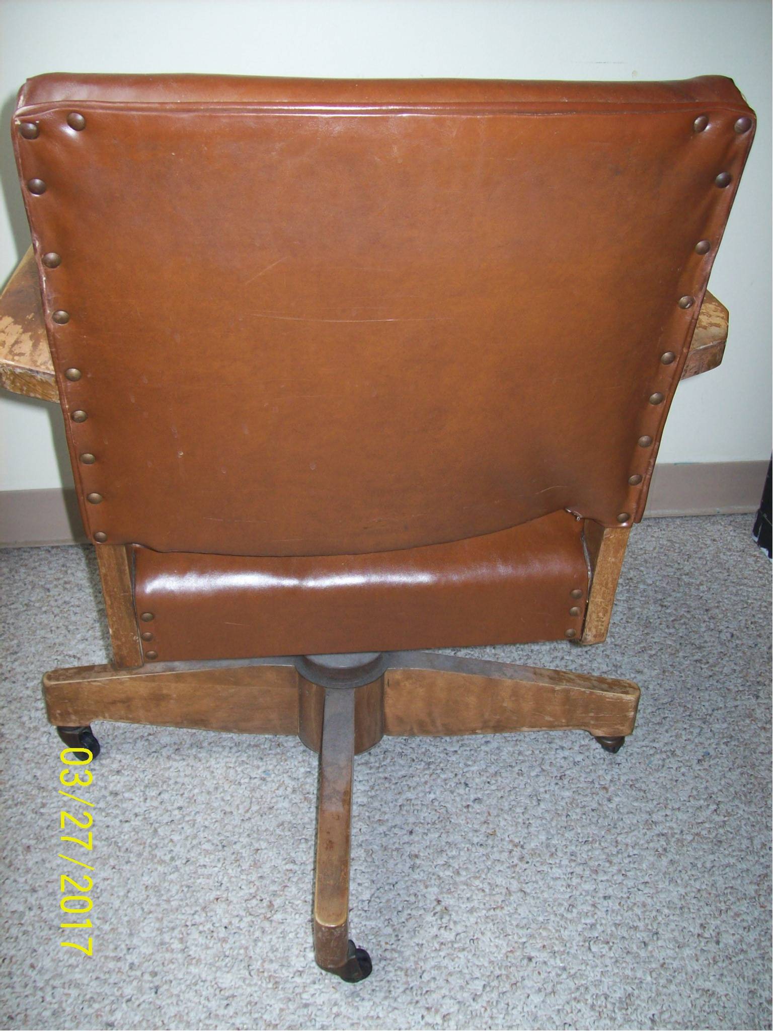 Antique Leather Office Chair -- Rocks and Swivels